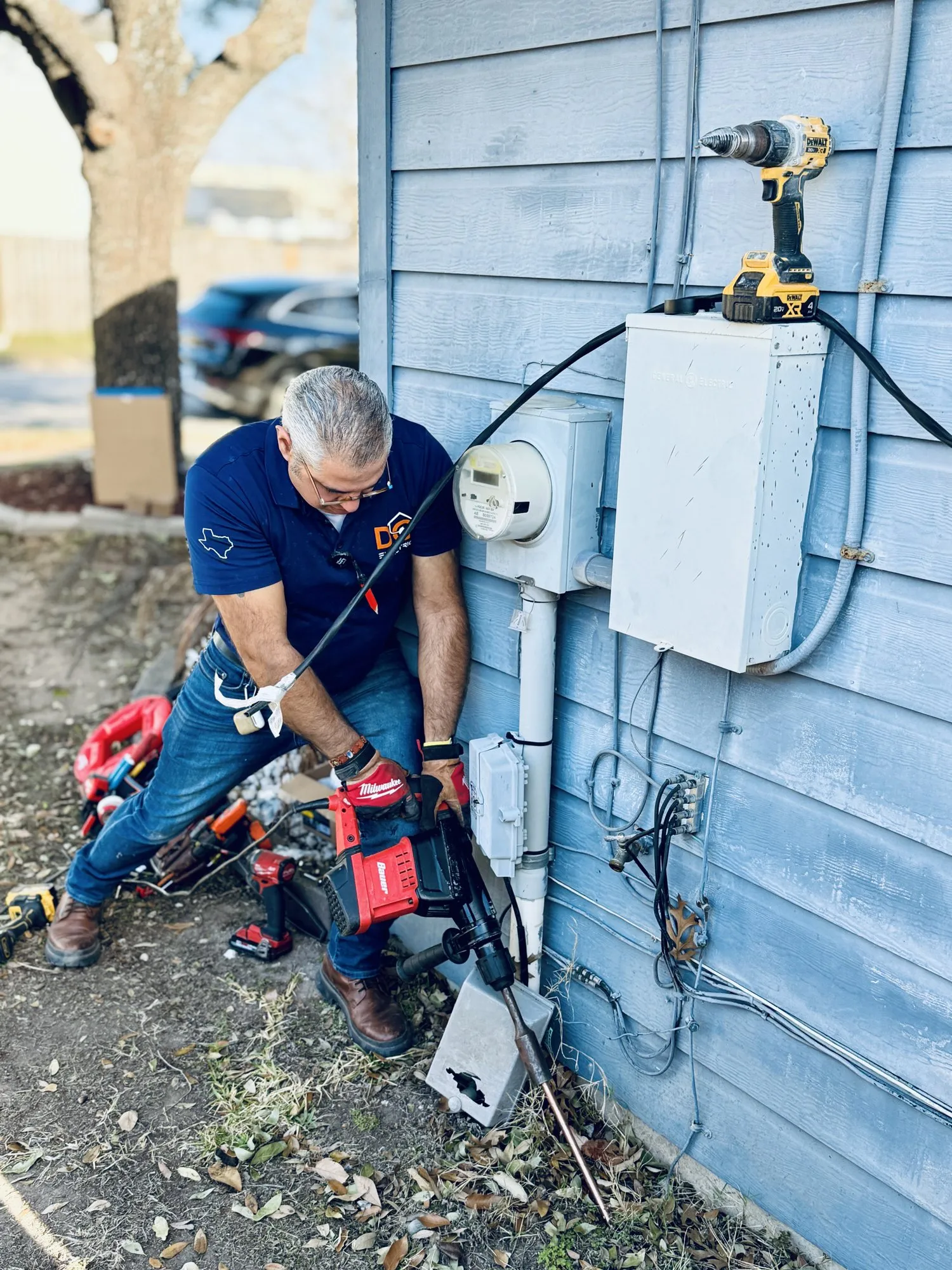 Installing new ground rods — licensed residential electrician in Austin TX (DC Electric)