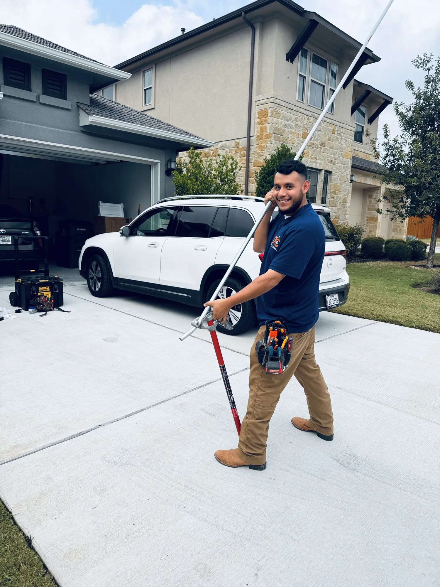 Johnny bending conduit on site — licensed residential electrician in Austin TX (DC Electric)