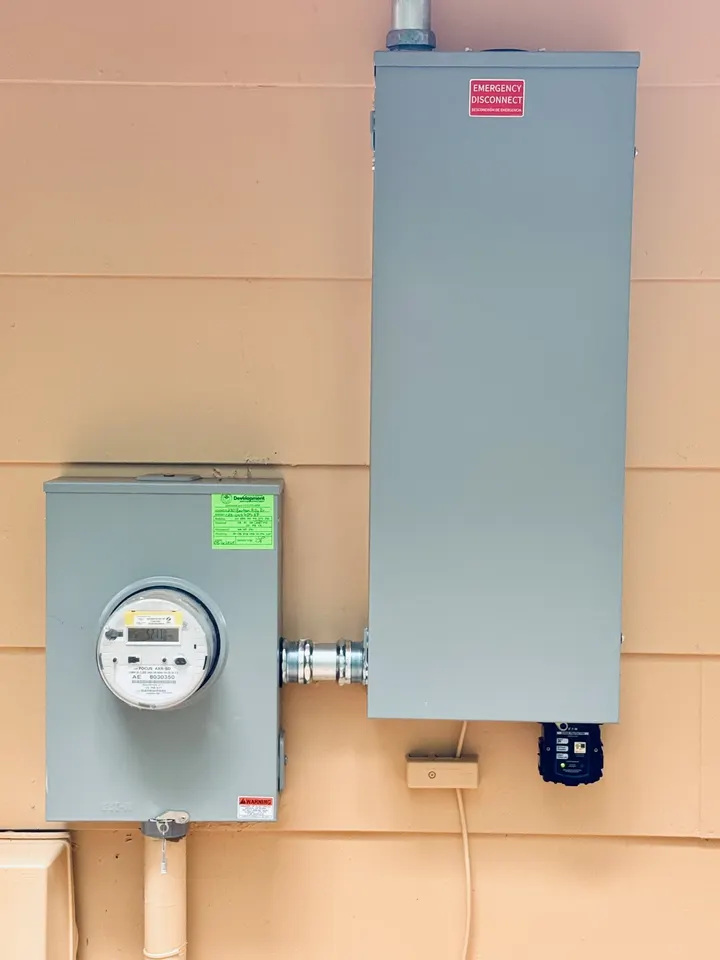 New PEC meter socket and exterior emergency disconnect installed by DC Electric