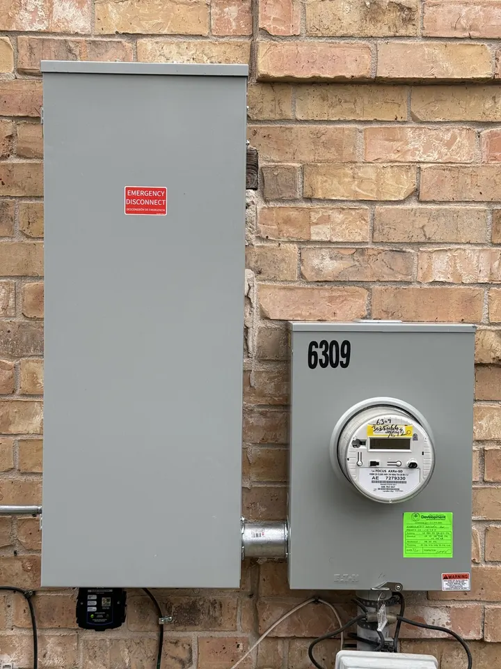 Passed municipal electrical inspection sticker on a DC Electric panel replacement in Kyle