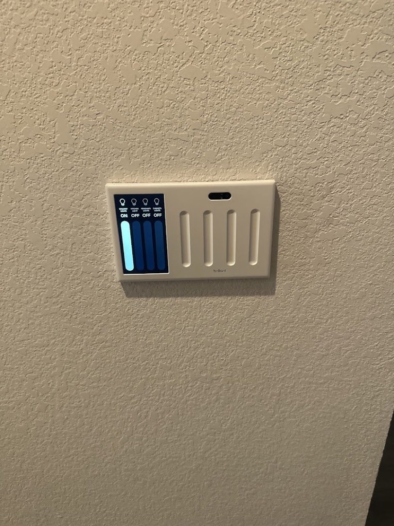 Multi-gang Lutron smart dimmer switches cleanly installed and leveled in an Austin home by DC Electric