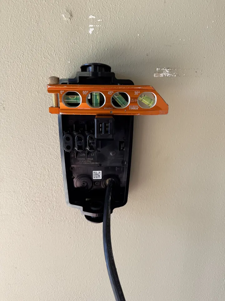 Garage Tesla Level 2 EV charger installation in Bee Cave TX