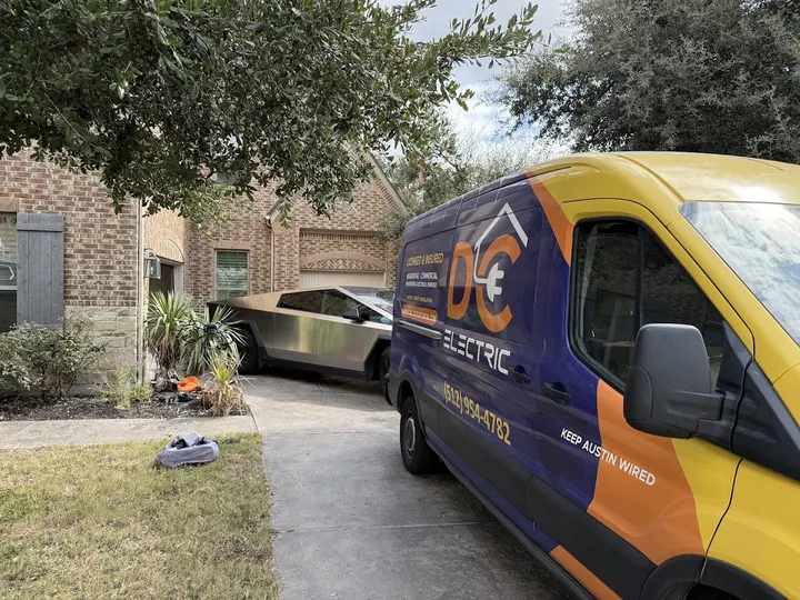 Tesla Cybertruck charging on a DC Electric installed home Level 2 Wall Connector in Pflugerville